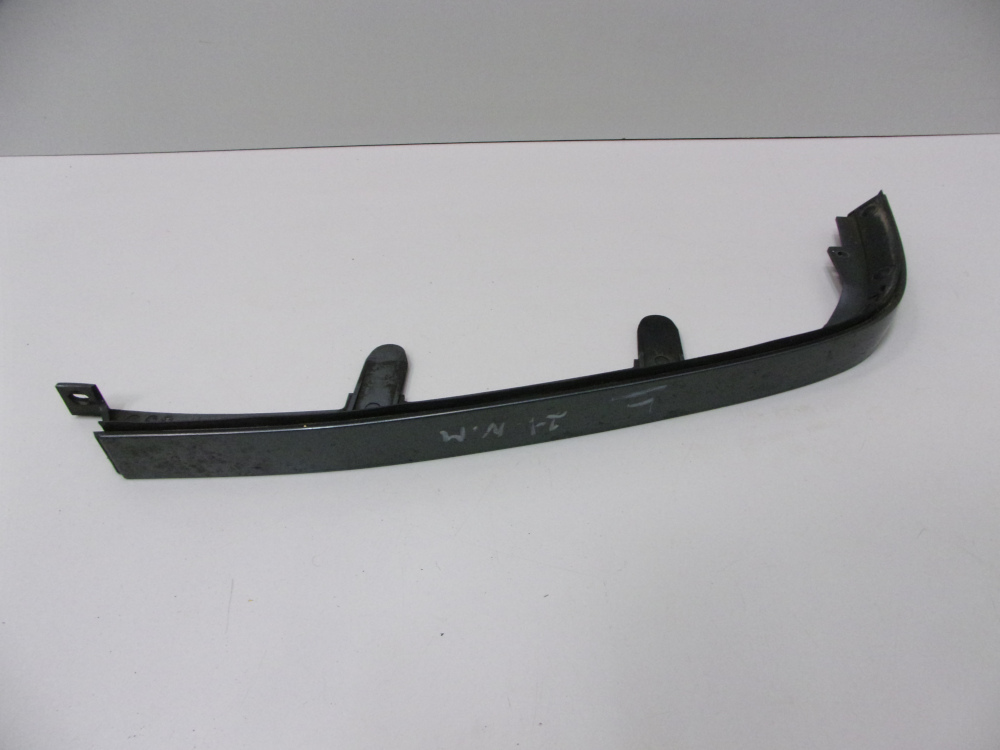 7700789900 Lišta pod levé přední světlo Renault R21 1992-